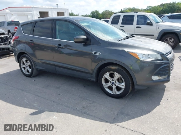 2015 Ford Escape SE with VIN 1FMCU0G7XFUA89965, listed as a IAAI auction lot 42072553 with 129,877 mi miles. Bid and sale history available at carsss.com. Image 1.