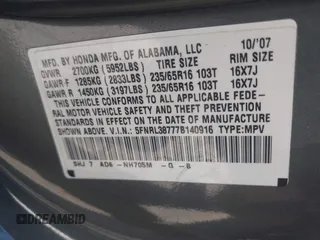 2007 Honda Odyssey EX-L with VIN 5FNRL38777B140916, listed as a IAAI auction lot 42159976 with 167,541 mi miles. Bid and sale history available at carsss.com. Image 9.