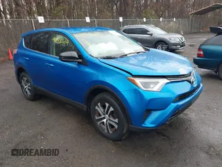2016 Toyota RAV4 LE with VIN JTMBFREV9GJ100635, listed as a IAAI auction lot 41858669 with 171,644 mi miles. Bid and sale history available at carsss.com. Image 1.