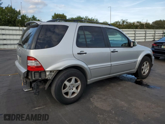2002 Mercedes-Benz M-Class with VIN 4JGAB75EX2A326747, listed as a Copart auction lot 82106664 with 264,245 mi miles and Salvage Title. Bid and sale history available at carsss.com. Image 3.