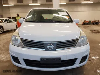 2009 Nissan Versa 1.8 S with VIN 3N1BC13E69L386083, listed as a IAAI auction lot 41717999 with 99,511 mi miles. Bid and sale history available at carsss.com. Image 13.