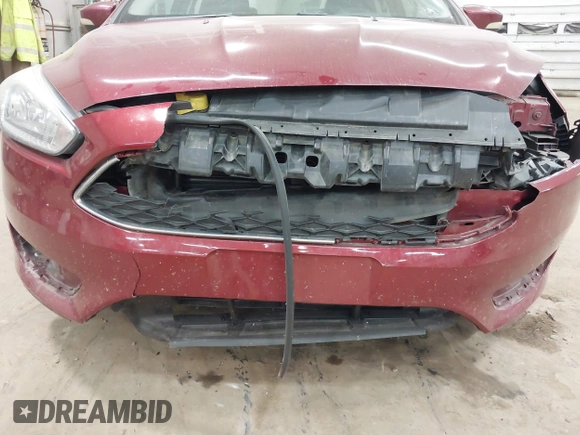 2015 Ford Focus SE with VIN 1FADP3F21FL270827, listed as a IAAI auction lot 42665015 with 162,745 mi miles and . Bid and sale history available at DreamBid. Image 6.