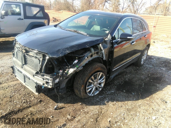 2022 Cadillac XT5 AWD Premium Luxury with VIN 1GYKNDR4XNZ164098, listed as a IAAI auction lot 41822372 with 32,644 mi miles and . Bid and sale history available at DreamBid. Image 18.