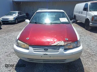 1999 Toyota Camry LE z VIN JT2BG22K3X0342513, wystawiony jako IAAI lot #42371033 z przebiegiem 159 894 mil mil oraz . Historia ofert i sprzedaży dostępna na DreamBid. Obrazek 6.