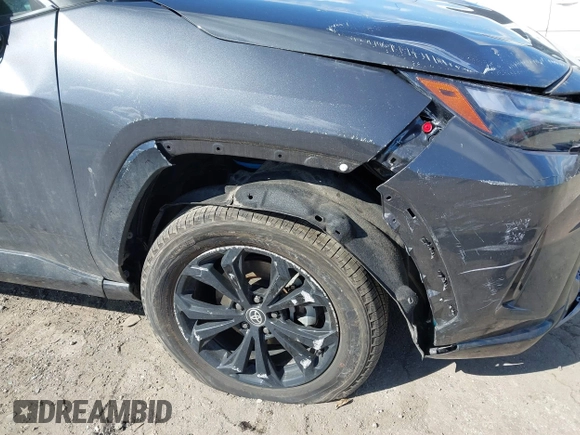 2024 Toyota RAV4 Hybrid SE with VIN 2T3T6RFV0RW051283, listed as a IAAI auction lot 41698931 with 6,465 mi miles and . Bid and sale history available at DreamBid. Image 6.