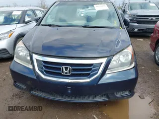 2009 Honda Odyssey EX-L with VIN 5FNRL38629B024694, listed as a IAAI auction lot 41958258 with 209,009 mi miles. Bid and sale history available at carsss.com. Image 12.