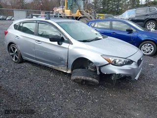 2019 Subaru Impreza Sport with VIN 4S3GTAM68K3736423, listed as a IAAI auction lot 41233064 with 71,007 mi miles. Bid and sale history available at carsss.com. Image 1.