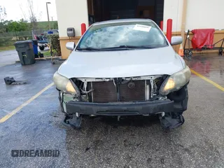 2013 Toyota Corolla L with VIN 5YFBU4EE7DP209207, listed as a IAAI auction lot 41990086 with 168,269 mi miles. Bid and sale history available at carsss.com. Image 6.