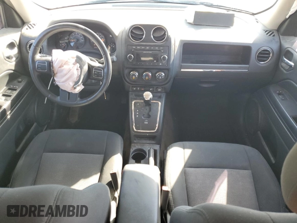 2014 Jeep Patriot Latitude with VIN 1C4NJRFB1ED847612, listed as a Copart auction lot 62721605 with 126,268 mi miles and Salvage title. Bid and sale history available at DreamBid. Image 8.