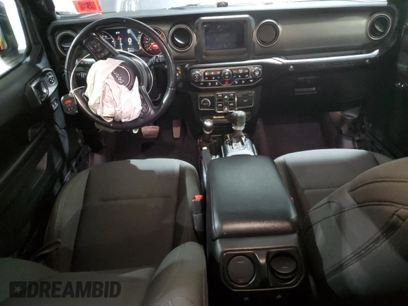 2020 Jeep Wrangler Unlimited Sport with VIN 1C4HJXDM7LW277445, listed as a Copart auction lot 82929714 with 27,570 mi miles and Salvage title. Bid and sale history available at DreamBid. Image 8.