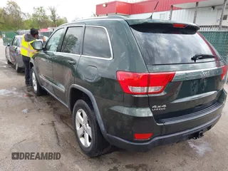 2011 Jeep Grand Cherokee 70th Anniversary with VIN 1J4RR4GG3BC631831, listed as a IAAI auction lot 42038415 with 130,811 mi miles. Bid and sale history available at carsss.com. Image 3.