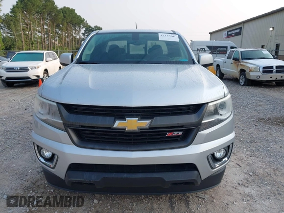 2016 Chevrolet Colorado z VIN 1GCHSDE34G1394629, wystawiony jako IAAI lot #42327361 z przebiegiem 46 911 mil mil oraz . Historia ofert i sprzedaży dostępna na DreamBid. Obrazek 13.