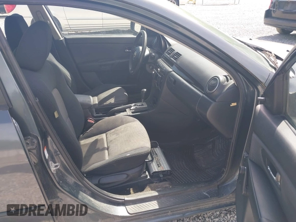 2009 Mazda 3 i Touring Value with VIN JM1BK32F291249221, listed as a IAAI auction lot 42006435 with 249,775 mi miles. Bid and sale history available at carsss.com. Image 5.