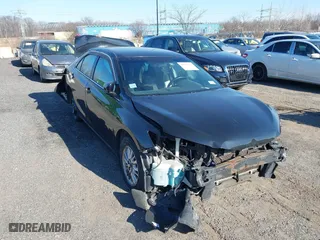 2015 Toyota Camry Hybrid LE with VIN 4T1BD1FK5FU170038, listed as a IAAI auction lot 41751734 with 292,193 mi miles. Bid and sale history available at carsss.com. Image 1.