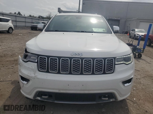 2018 Jeep Grand Cherokee Overland with VIN 1C4RJFCG5JC437508, listed as a Copart auction lot 51814795 with 104,598 mi miles and Salvage title. Bid and sale history available at DreamBid. Image 5.