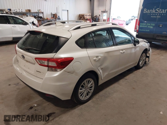 2017 Subaru Impreza Premium with VIN 4S3GTAD61H3727314, listed as a IAAI auction lot 42316108 with 111,215 mi miles and . Bid and sale history available at DreamBid. Image 4.