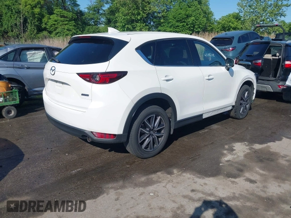 2018 Mazda CX-5 Grand Touring z VIN JM3KFBDM8J0420422, wystawiony jako IAAI lot #42188348 z przebiegiem 102 216 mil mil oraz . Historia ofert i sprzedaży dostępna na DreamBid. Obrazek 4.