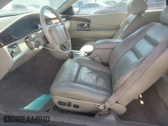 1998 Cadillac Eldorado z VIN 1G6EL12YXWU610918, wystawiony jako Copart lot #57309075 z przebiegiem 168 228 mil mil oraz Szkoda całkowita • Salvage title. Historia ofert i sprzedaży dostępna na DreamBid. Obrazek 7.