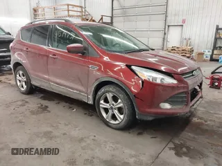 2014 Ford Escape SE with VIN 1FMCU9GXXEUD96930, listed as a IAAI auction lot 41574851 with 140,252 mi miles. Bid and sale history available at carsss.com. Image 1.