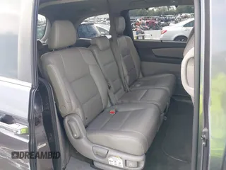 2014 Honda Odyssey EX-L with VIN 5FNRL5H64EB026520, listed as a IAAI auction lot 42562290 with 118,890 mi miles and . Bid and sale history available at DreamBid. Image 8.