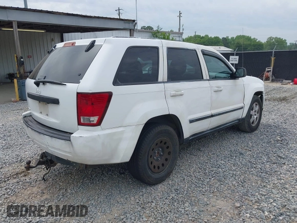 2008 Jeep Grand Cherokee Laredo with VIN 1J8GS48K88C113512, listed as a IAAI auction lot 42093765 with 251,406 mi miles. Bid and sale history available at carsss.com. Image 4.