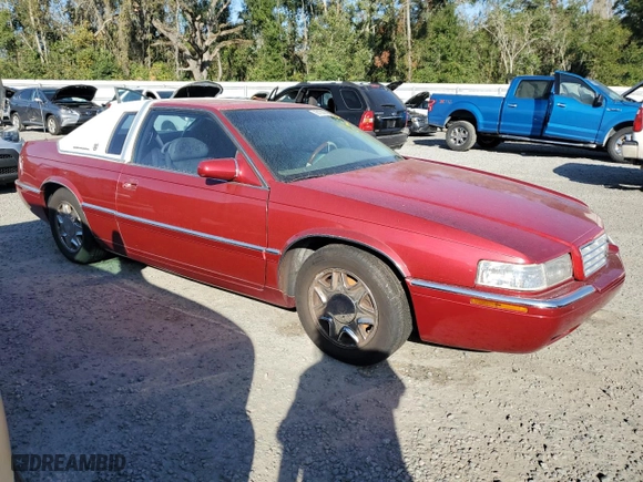 2000 Cadillac Eldorado with VIN 1G6EL12Y9YU174579, listed as a Copart auction lot 80138994 with 0 mi miles and Salvage Title. Bid and sale history available at carsss.com. Image 4.