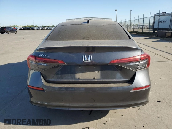 2022 Honda Civic LX z VIN 2HGFE2F26NH517811, wystawiony jako Copart lot #52933645 z przebiegiem Nie podano mil oraz Szkoda całkowita • Salvage title. Historia ofert i sprzedaży dostępna na DreamBid. Obrazek 6.