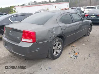 2010 Dodge Charger SXT with VIN 2B3CA3CV5AH118174, listed as a IAAI auction lot 41498019 with 336,323 mi miles. Bid and sale history available at carsss.com. Image 4.