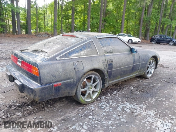 1989 Nissan 300ZX z VIN JN1HZ14S7KX290051, wystawiony jako IAAI lot #42203078 z przebiegiem 136 643 mil mil oraz . Historia ofert i sprzedaży dostępna na DreamBid. Obrazek 4.