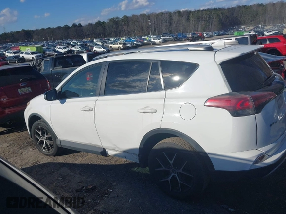 2016 Toyota RAV4 SE with VIN JTMNFREV3GJ070562, listed as a IAAI auction lot 41246655 with 89,174 mi miles and . Bid and sale history available at DreamBid. Image 14.