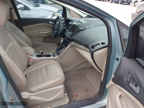 2013 Ford C-Max Hybrid SEL with VIN 1FADP5BU8DL523402, listed as a IAAI auction lot 41676386 with 214,649 mi miles. Bid and sale history available at carsss.com. Image 5.
