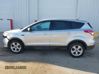2016 Ford Escape SE with VIN 1FMCU9GX0GUA13421, listed as a IAAI auction lot 41788760 with 123,062 mi miles and . Bid and sale history available at DreamBid. Image 15.