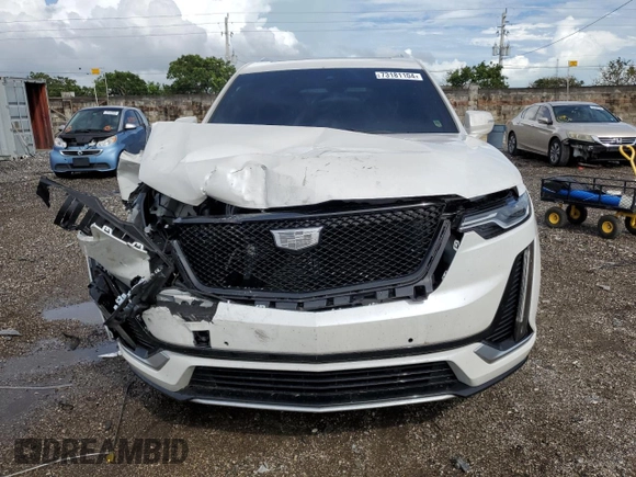 2021 Cadillac XT6 Premium Luxury z VIN 1GYKPCRS3MZ230783, wystawiony jako Copart lot #73181104 z przebiegiem 62 078 mil mil oraz Nie do naprawy • Non repairable. Historia ofert i sprzedaży dostępna na DreamBid. Obrazek 5.