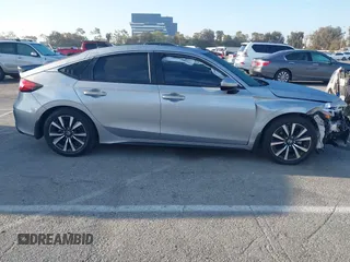 2024 Honda Civic EX-L z VIN 19XFL1H70RE022707, wystawiony jako IAAI lot #41852356 z przebiegiem 23 137 mil mil oraz . Historia ofert i sprzedaży dostępna na DreamBid. Obrazek 13.