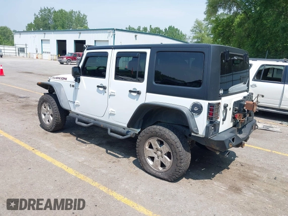 2015 Jeep Wrangler Unlimited Rubicon z VIN 1C4BJWFGXFL755810, wystawiony jako IAAI lot #42495531 z przebiegiem 109 668 mil mil oraz . Historia ofert i sprzedaży dostępna na DreamBid. Obrazek 3.
