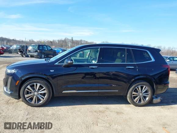 2021 Cadillac XT6 Premium Luxury z VIN 1GYKPDRS8MZ175544, wystawiony jako IAAI lot #41591775 z przebiegiem 39 290 mil mil oraz . Historia ofert i sprzedaży dostępna na DreamBid. Obrazek 14.