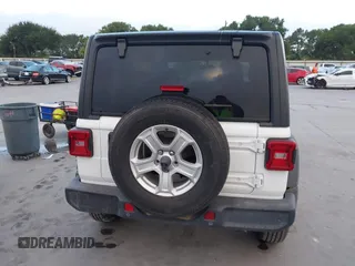 2019 Jeep Wrangler Unlimited Sport S with VIN 1C4HJXDG2KW500662, listed as a IAAI auction lot 42571152 with 45,067 mi miles and . Bid and sale history available at DreamBid. Image 16.