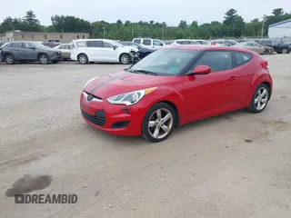 2013 Hyundai Veloster w/Gray Int with VIN KMHTC6AD0DU145090, listed as a IAAI auction lot 42618390 with 126,641 mi miles and . Bid and sale history available at DreamBid. Image 2.
