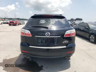 2012 Mazda CX-9 Grand Touring with VIN JM3TB2DA4C0361023, listed as a Copart auction lot 63839005 with 140,784 mi miles and Salvage title. Bid and sale history available at DreamBid. Image 6.