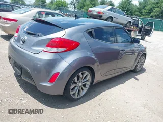 2012 Hyundai Veloster w/Black Int with VIN KMHTC6ADXCU061325, listed as a IAAI auction lot 42556398 with 122,954 mi miles and . Bid and sale history available at DreamBid. Image 4.