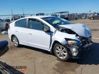 2010 Honda Insight EX with VIN JHMZE2H79AS039292, listed as a IAAI auction lot 41880303 with Not Provided miles and . Bid and sale history available at DreamBid. Image 13.