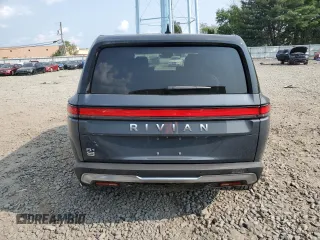 2024 Rivian R1S Adventure z VIN 7PDSGBBA0RN038679, wystawiony jako Copart lot #66486464 z przebiegiem Nie podano mil oraz Szkody całkowita. Historia ofert i sprzedaży dostępna na DreamBid. Obrazek 6.