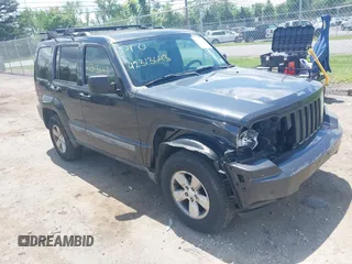 2011 Jeep Liberty Sport Jet z VIN 1J4PN2GK5BW512186, wystawiony jako IAAI lot #42313643 z przebiegiem 188 171 mil mil oraz . Historia ofert i sprzedaży dostępna na DreamBid. Obrazek 1.