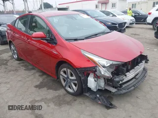 2017 Toyota Prius Two with VIN JTDKARFU4H3538215, listed as a IAAI auction lot 42487387 with 153,789 mi miles and . Bid and sale history available at DreamBid. Image 1.