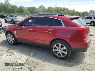 2016 Cadillac SRX Premium Collection with VIN 3GYFNDE3XGS508897, listed as a Copart auction lot 57886515 with 163,477 mi miles and Salvage title. Bid and sale history available at DreamBid. Image 2.