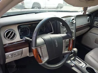 2009 Lincoln MKZ z VIN 3LNHM26T39R612027, wystawiony jako IAAI lot #42286784 z przebiegiem 1 088 138 mil mil oraz . Historia ofert i sprzedaży dostępna na DreamBid. Obrazek 17.