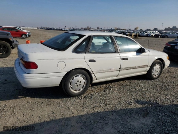 1993 Ford Taurus GL with VIN 1FALP5247PG143248, listed as a Copart auction lot 83922634 with 605,096 mi miles and Salvage Title. Bid and sale history available at carsss.com. Image 3.