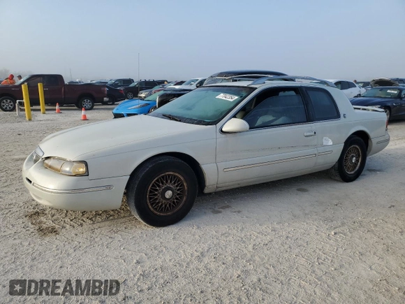 1997 Mercury Cougar z VIN 1MELM62W0VH602622, wystawiony jako Copart lot #77042354 z przebiegiem 122 027 mil mil oraz Nie do naprawy. Historia ofert i sprzedaży dostępna na DreamBid. Obrazek 1.