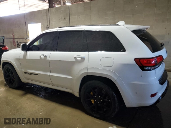 2020 Jeep Grand Cherokee Trackhawk with VIN 1C4RJFN97LC141522, listed as a Copart auction lot 80134014 with 53,494 mi miles and Salvage title. Bid and sale history available at DreamBid. Image 2.