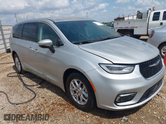 2023 Chrysler Pacifica Touring L with VIN 2C4RC1BG7PR521232, listed as a IAAI auction lot 42087909 with 34,609 mi miles and . Bid and sale history available at DreamBid. Image 1.